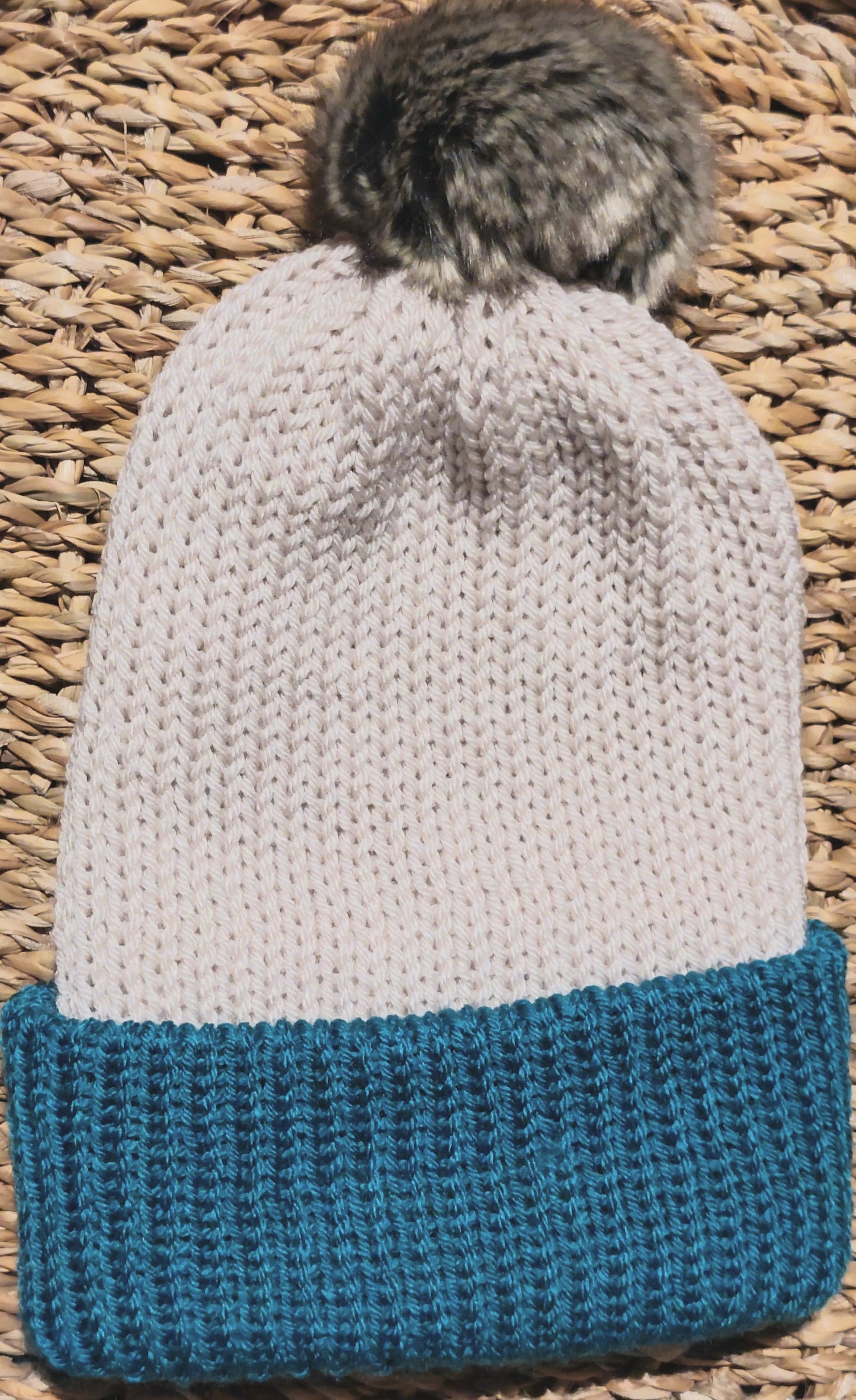 beanie with a pom poms