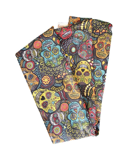 Colorful sugar skull patterned Wrap headwrap n a white background