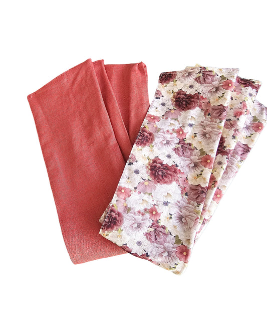 Two sets of fabric swatches, one solid red and one floral patterned, on a white background.